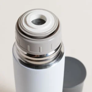 TERMO DE ACERO INOXIDABLE BLANCO TAPA GRIS TOPO